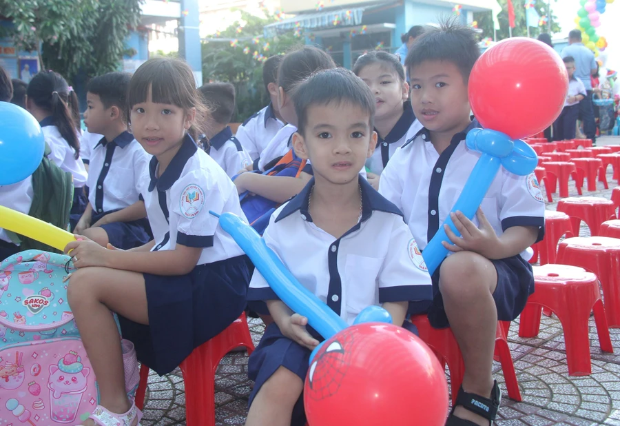 Học sinh TPHCM hân hoan trong ngày tựu trường. Ảnh minh họa: MA