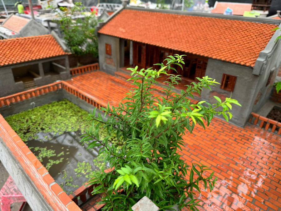 Mô hình nhà cổ do anh Tiên làm. dau-an-lang-que-giua-dong-do-thi-hoa-1.jpg