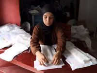 Chùm ảnh thợ may Gaza thời chiến