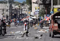 Chùm ảnh bạo lực băng đảng bao trùm Port-au-Prince của Haiti