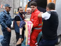 Chùm ảnh người Armenia ở Karabakh ồ ạt di cư 