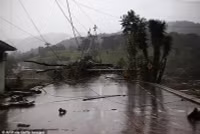 Chùm ảnh bão tấn công làm vỡ đập thủy điện, ít nhất 29 người thiệt mạng