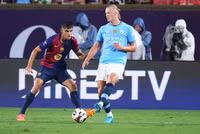 barca-haaland-090534.jpg