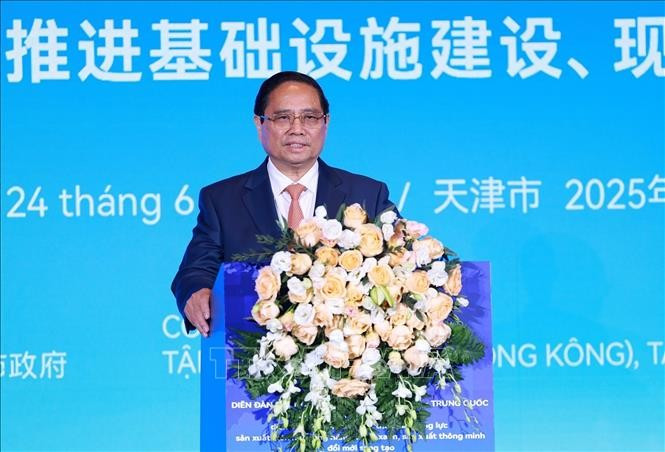 Thủ tướng Phạm Minh Chính phát biểu tại Diễn đàn kết nối doanh nghiệp Việt Nam - Trung Quốc. (Ảnh: Dương Giang/TTXVN)
