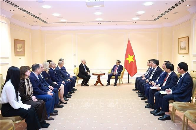 Thủ tướng Phạm Minh Chính tiếp đại diện lãnh đạo Tập đoàn TH True Milk của Việt Nam đang đầu tư tại Liên bang Nga. Ảnh: Dương Giang/TTXVN