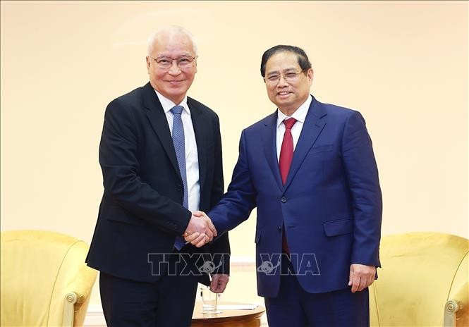 Thủ tướng Phạm Minh Chính tiếp đại diện lãnh đạo Tập đoàn TH True Milk của Việt Nam đang đầu tư tại Liên bang Nga. Ảnh: Dương Giang/TTXVN