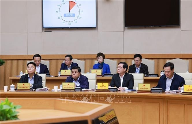 Các Phó Thủ tướng tham dự Phiên họp Chính phủ chuyên đề về Trung tâm Tài chính quốc tế tại Việt Nam. Ảnh: Dương Giang/TTXVN