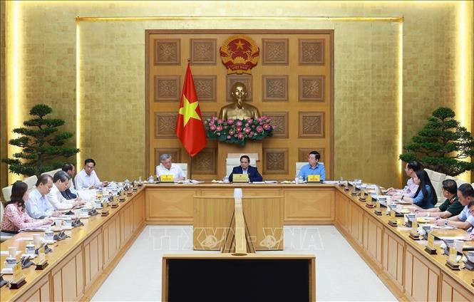 Thủ tướng Phạm Minh Chính chủ trì họp triển khai Triển lãm thành tựu của đất nước nhân dịp kỷ niệm 80 năm Quốc khánh. (Ảnh: Dương Giang/TTXVN)