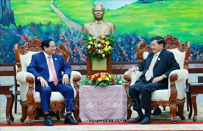 Thủ tướng Phạm Minh Chính hội kiến Tổng Bí thư, Chủ tịch nước Lào Thongloun Sisoulith. Ảnh: Dương Giang/TTXVN