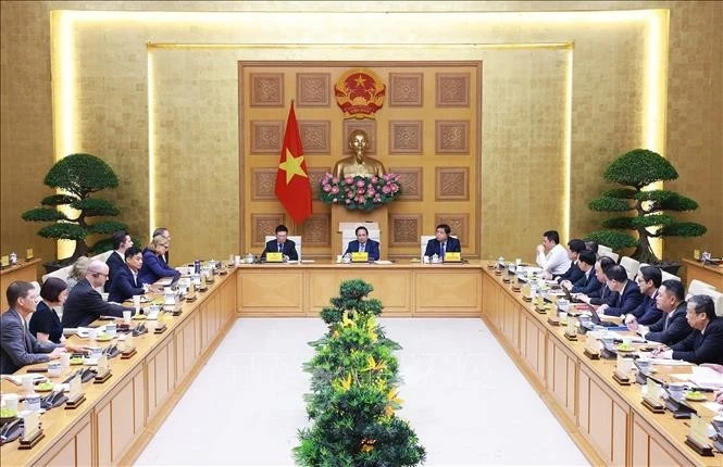 Thủ tướng Phạm Minh Chính gặp mặt đại diện các doanh nghiệp Hoa Kỳ đang đầu tư, kinh doanh tại Việt Nam. (Ảnh: Dương Giang/TTXVN)