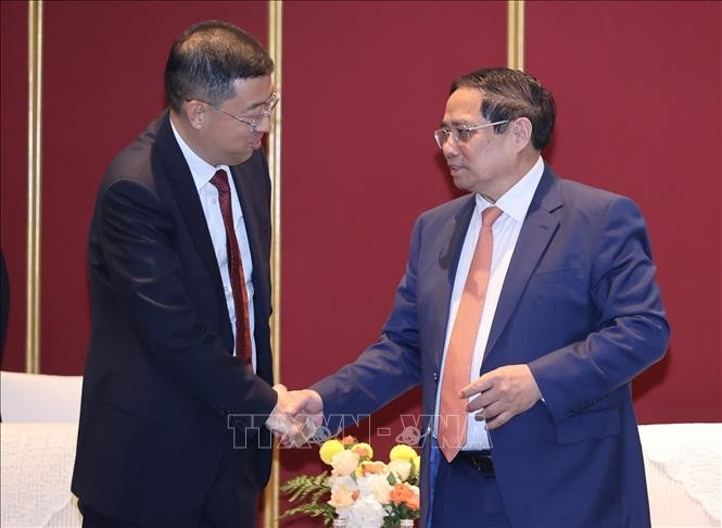 Thủ tướng Phạm Minh Chính tiếp ông Cát Hải Kiều, Chủ tịch Ngân hàng Trung Quốc (BOC). (Ảnh: Dương Giang/TTXVN) 62.jpg