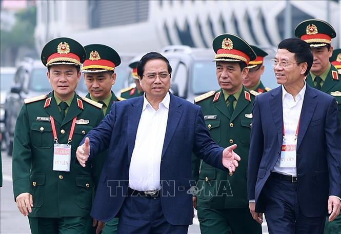 Thủ tướng Phạm Minh Chính làm việc với Bộ Quốc phòng và các bộ, ngành về kết quả hoạt động nghiên cứu, sản xuất, phát triển công nghiệp quốc phòng. Ảnh: Dương Giang/TTXVN