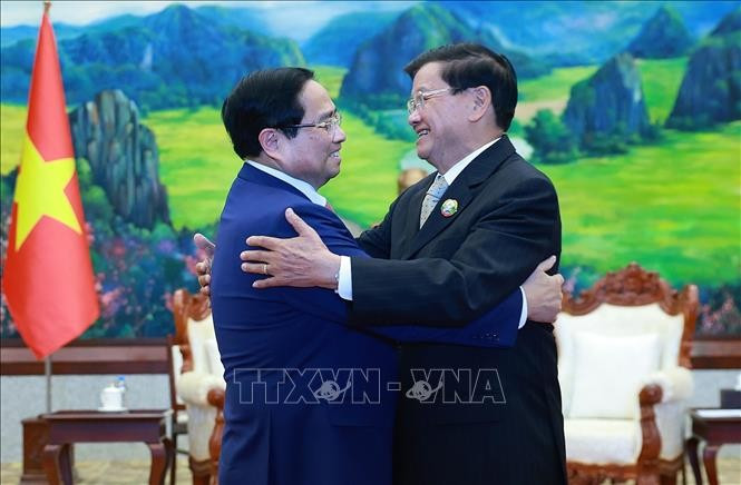 Thủ tướng Phạm Minh Chính hội kiến Tổng Bí thư, Chủ tịch nước Lào Thongloun Sisoulith. Ảnh: Dương Giang/TTXVN