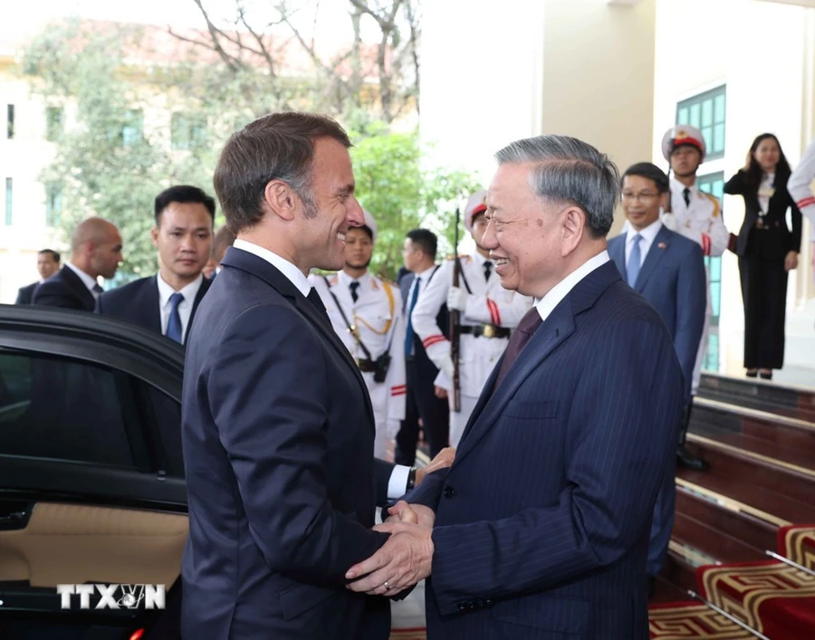 Tổng Bí thư Tô Lâm tiếp Tổng thống Pháp Emmanuel Macron. Ảnh: Thống Nhất/TTXVN.