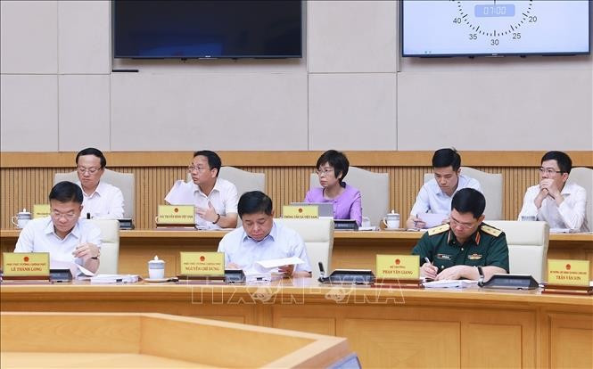 Các thành viên Chính phủ và đại biểu tham dự Phiên họp Chính phủ chuyên đề về xây dựng pháp luật tháng 5 năm 2025. (Ảnh: Dương Giang/TTXVN)