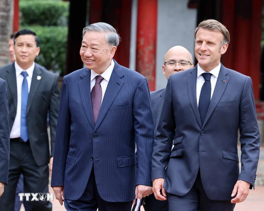 Tổng Bí thư Tô Lâm và Tổng thống Pháp Emmanuel Macron. (Ảnh: Thống Nhất/TTXVN).