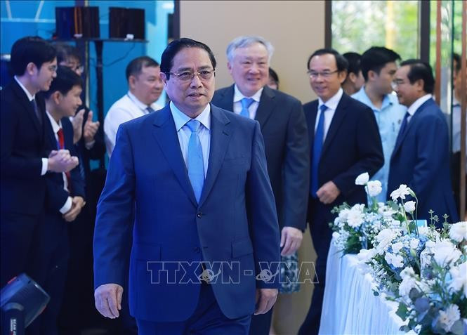 Thủ tướng Phạm Minh Chính đến dự Lễ ra mắt Trung tâm Tài chính quốc tế Việt Nam tại TPHCM. Ảnh: Dương Giang/TTXVN