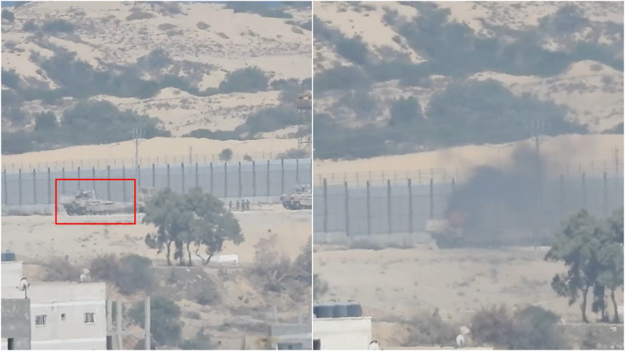 Xe thiết giáp Namer của Israel bị trúng tên lửa HJ-8 do các tay súng Hamas phóng đi.