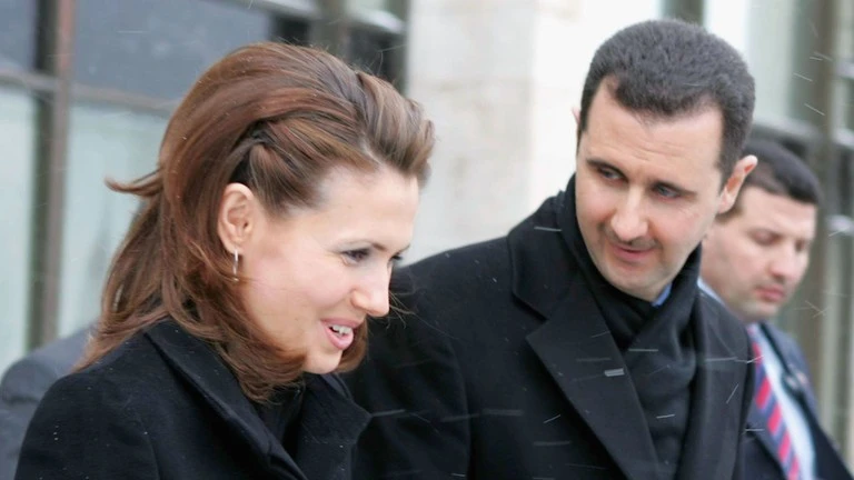 Cựu Tổng thống Syria, Bashar Al-Assad, và vợ Asma Assad.