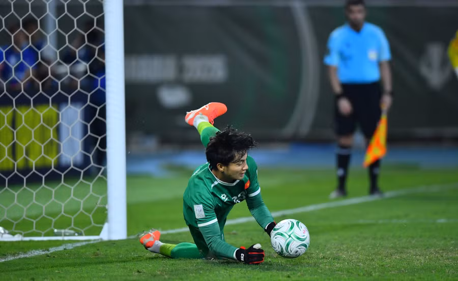 Thủ môn Văn Bình có 10 lần cản phá thành công các pha dứt điểm của U23 Hàn Quốc. Ảnh: AFC.