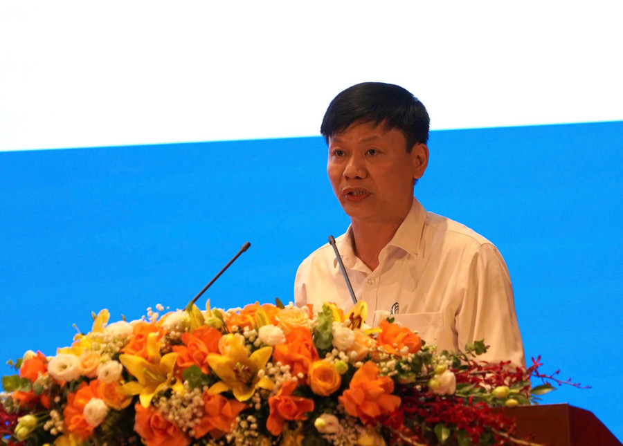 Ông Nguyễn Thanh Đề, Vụ trưởng Vụ Giáo dục Mầm non báo cáo tại hội nghị. Ảnh: Minh Cương