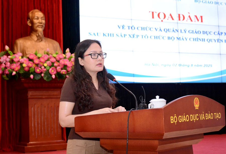 Bà Mai Thị Anh, Vụ trưởng Vụ Pháp chế báo cáo tại tọa đàm. 4.jpg