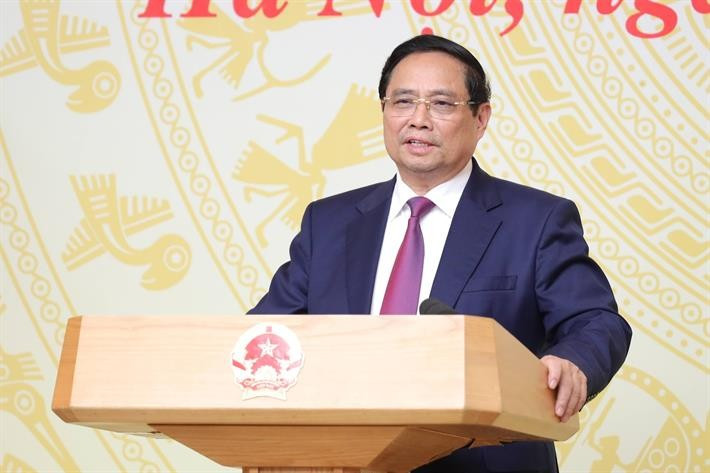 นายกรัฐมนตรี ฝ่าม มิญ จิ่ง กล่าวสุนทรพจน์ในการประชุม 1-941.jpg