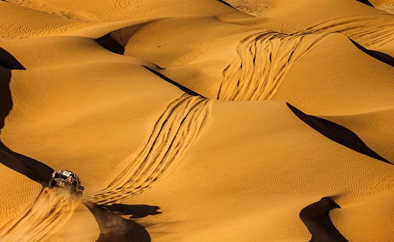 Guoyu Zhang và Yicheng Wang của đội đua Mintimes Yunxiang Rally đang hành động trong chặng 2 của giải đua Dakar Rally. Ảnh: REUTERS/Maxim Shemetov chum-anh-giai-dua-xe-dakar-rally-2025-01.jpg