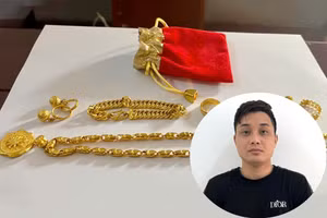 Đối tượng Hoàng Vũ Lập và tang vật vụ án. (Ảnh: CANA)