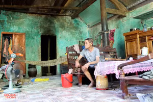 Hàng chục hộ dân vùng lòng hồ thủy lợi Bản Mồng (Nghệ An) chưa được tái định cư. (Ảnh: Phạm Tâm)