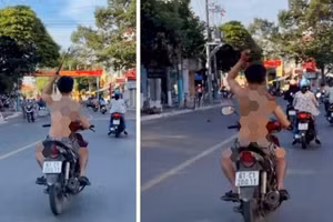 Võ Văn Chánh vừa điều khiển máy vừa cầm một cây rựa cán gỗ dài khoảng 60cm “múa” trên đường.