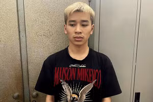 Thân Văn Nam tại cơ quan công an.