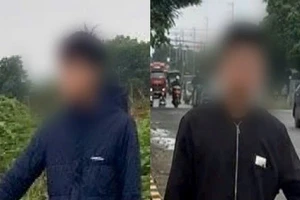 Công an lập biên bản xử lý trường hợp bắn ná cao su gây thương tích người đi đường.