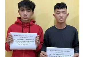 Hoàng Văn Minh (trái) và Hoàng Văn Huy.