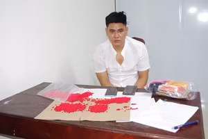 Dương Hoài Nam tại cơ quan công an (Ảnh CA).