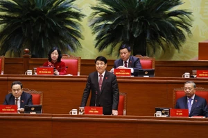 Đồng chí Lương Cường, Ủy viên Bộ Chính trị, Chủ tịch nước điều hành phiên thảo luận sáng 21/1. Ảnh: TTXVN