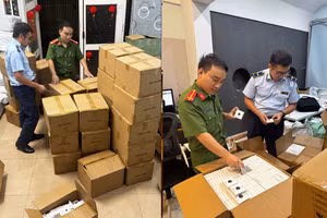Lực lượng chức năng TP Hà Nội kiểm đếm, niêm phong hàng hóa vi phạm.