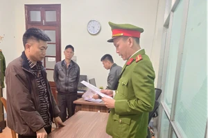 Bị can Hoàng Văn Quân tại cơ quan công an.