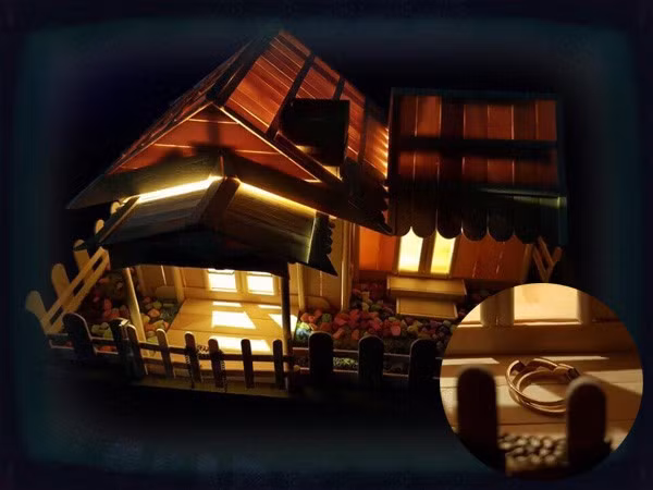 Trung Kiên gây bất ngờ cho Lê Phương khi tự tay làm tặng cô ngôi nhà mô hình bằng gỗ bên trong có cặp nhẫn cưới.