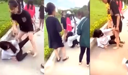 Hình ảnh nữ sinh H.G.N (Trường THCS Điện Biên) bị đánh hội đồng. (Ảnh: Cắt từ clip).