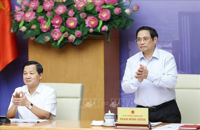 Thủ tướng Phạm Minh Chính và Phó Thủ tướng Lê Minh Khái chủ trì Hội nghị Phát triển thị trường bất động sản an toàn, lành mạnh, bền vững. Ảnh: Dương Giang/TTXVN.