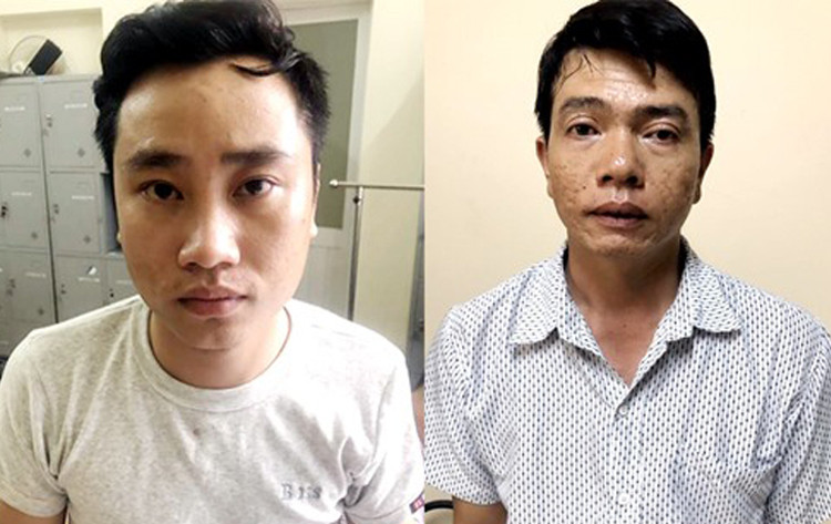 Đỗ Văn Tuấn (trái) và Trịnh Đức Hùng tại cơ quan điều tra. Ảnh: Công an cung cấp.