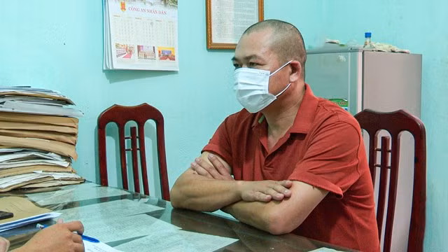 Tài xế Trần Đình Quảng tại cơ quan công an.