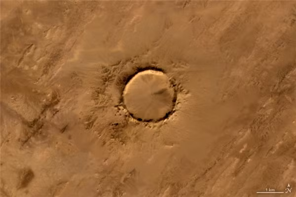 Chữ O:&nbsp;Miệng thiên thạch Tenoumer, nằm trên lãnh thổ nước Cộng hòa Hồi giáo Mauritanie, Tây Phi, được hình thành sau khi một thiên thạch đâm trúng Trái Đất từ cách đây 10.000-30.000 năm.