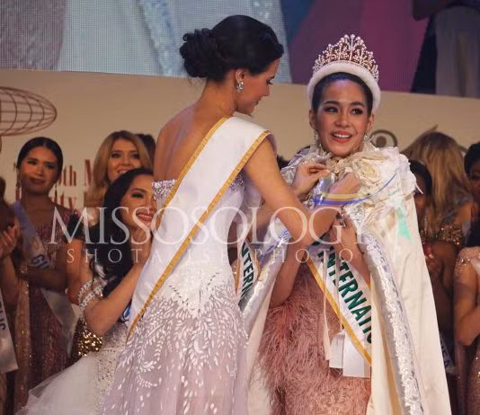 Nhan sắc rạng ngời của tân Hoa hậu Quốc tế - Ảnh 1.