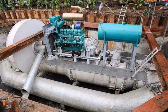 TP HCM chốt thuê siêu máy bơm đường Nguyễn Hữu Cảnh: Hơn 14,2 tỉ đồng/năm - Ảnh 1.