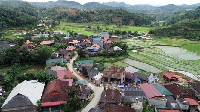 Một cụm dân cư ở huyện Thuận Châu nằm trong diện phải sáp nhập. Chú thích ảnh