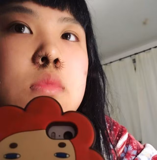 Kỳ quặc xu hướng làm đẹp “kéo dài lông mũi” - 4