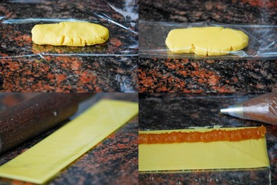 Cắt màng bọc thực phẩm thành những tấm có kích thước 20cm x 35cm. Múc 50 bột bánh cho vào tấm màng thực phẩm và cuộn màng bọc lại. Bạn dùng thanh cán, cán bột thành tấm mỏng hình chữ nhật có kích thước khoảng 5cm x 28cm (khi đó vỏ bánh dày khoảng 0,2cm). Tiếp đó bạn rỡ màng thực phẩm ra rồi dùng túi bắt kem để cho mứt dứa vào bánh, bạn bắt mứt dứa thành một đường ở gần mép dọc chiều dài vỏ bánh. Cắt màng bọc thực phẩm thành những tấm có kích thước 20cm x 35cm. Múc 50 bột bánh cho vào tấm màng thực phẩm và cuộn màng bọc lại. Bạn dùng thanh cán, cán bột thành tấm mỏng hình chữ nhật có kích thước khoảng 5cm x 28cm (khi đó vỏ bánh dày khoảng 0,2cm). Tiếp đó bạn rỡ màng thực phẩm ra rồi dùng túi bắt kem để cho mứt dứa vào bánh, bạn bắt mứt dứa thành một đường ở gần mép dọc chiều dài vỏ bánh.