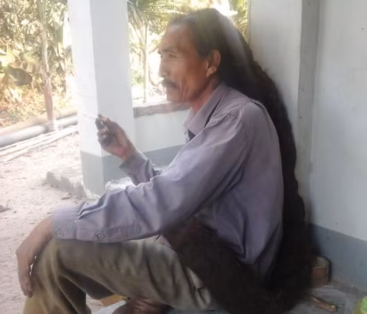 ‘Dị nhân’ Hồ Vũ với mái tóc dài hơn 1,5m.